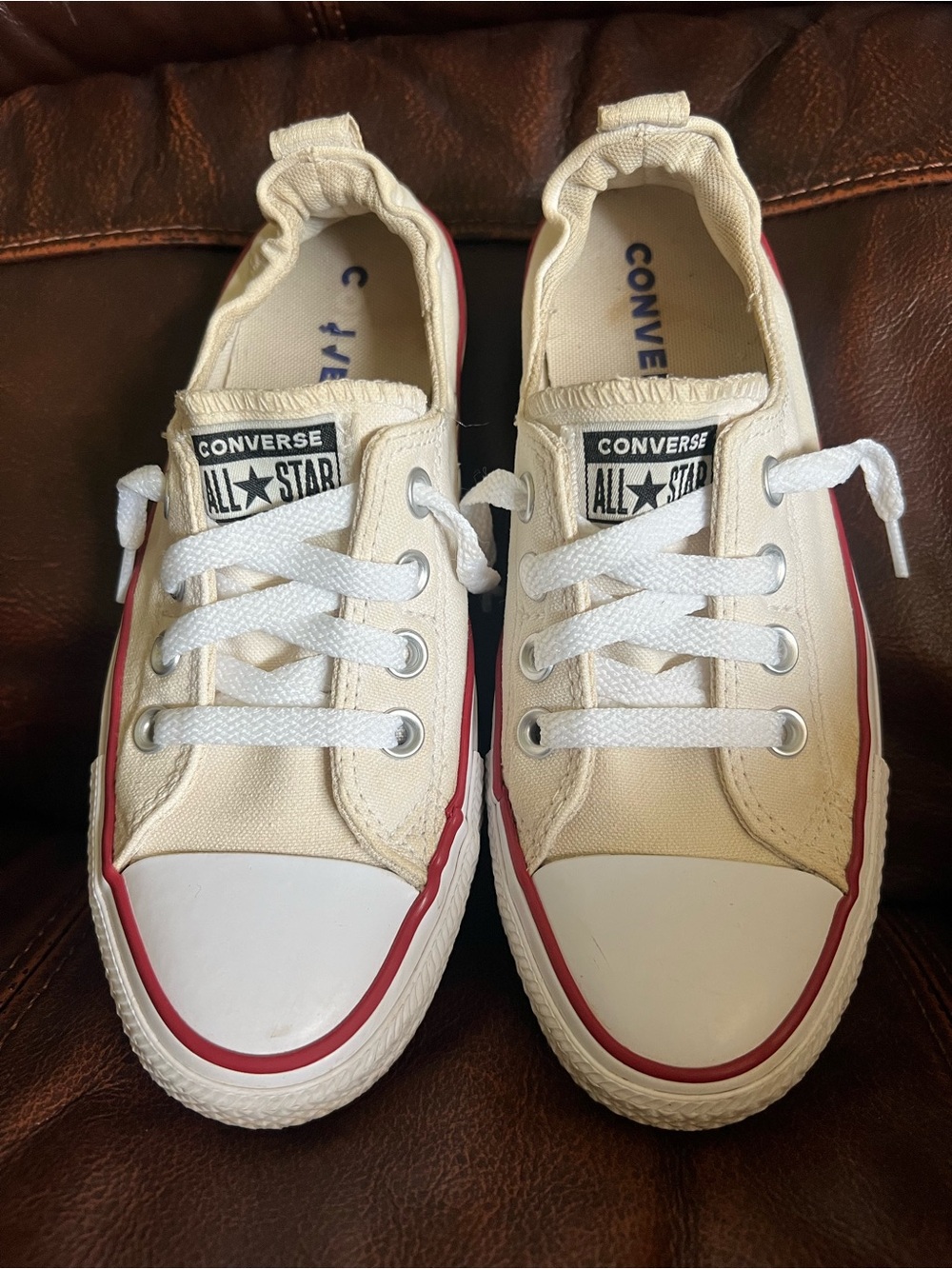 Converse Women’s Low Top Sneakers in White and Red Trim